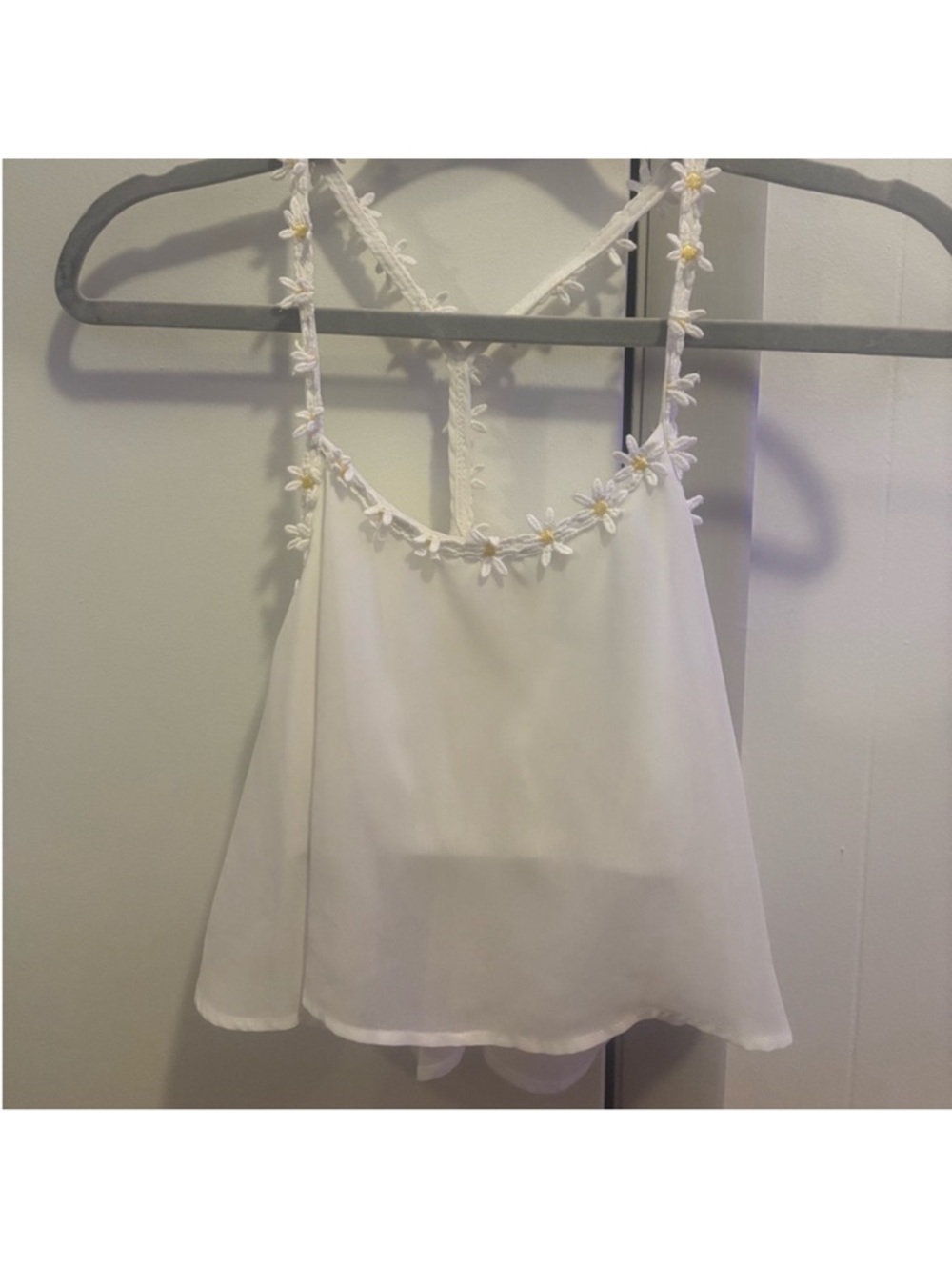 Double Zero White Sleeveless Top with Subtle Ribbon Label